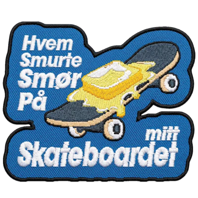 Strykestæsj Badge Smør på Skateboard